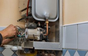 Why Is My Water Heater Leaking From the Bottom? Common Causes &amp; When Replacement Beats Repair
